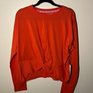 NwOT. Women’s DKNY Sport long sleeve top. Size L.